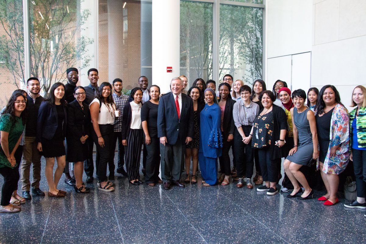 Group shot with Senator Dick Durbin in the center.