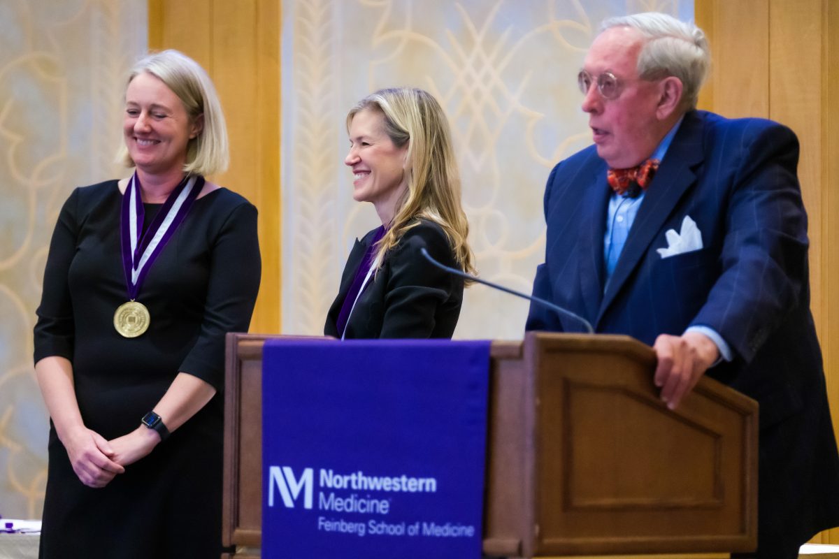 Cecilia Berin, PhD, (left) was invested as the inaugural Bunning Professor of Food Allergy Research. Susan E. Quaggin, MD, chair of the Department of Medicine and the Charles Horace Mayo Professor (middle), bestowed the ceremonial medallion upon her. Dean Eric G. Neilson, MD, (right) presided.