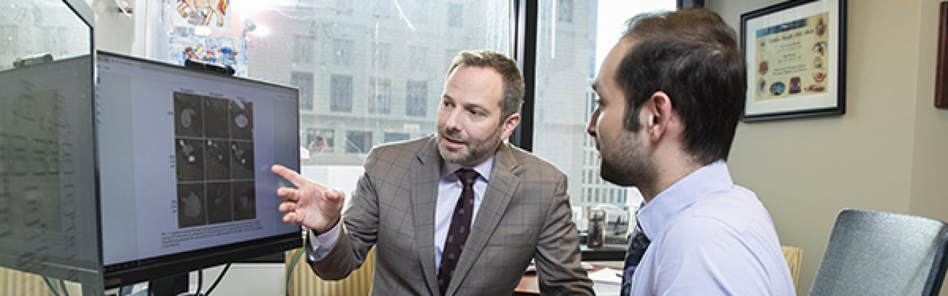 Third-year medical student Khizar Nandoliya and his mentor Stephen T. Magill, MD, PhD, assistant professor of Neurological Surgery