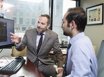 Third-year medical student Khizar Nandoliya and his mentor Stephen T. Magill, MD, PhD, assistant professor of Neurological Surgery